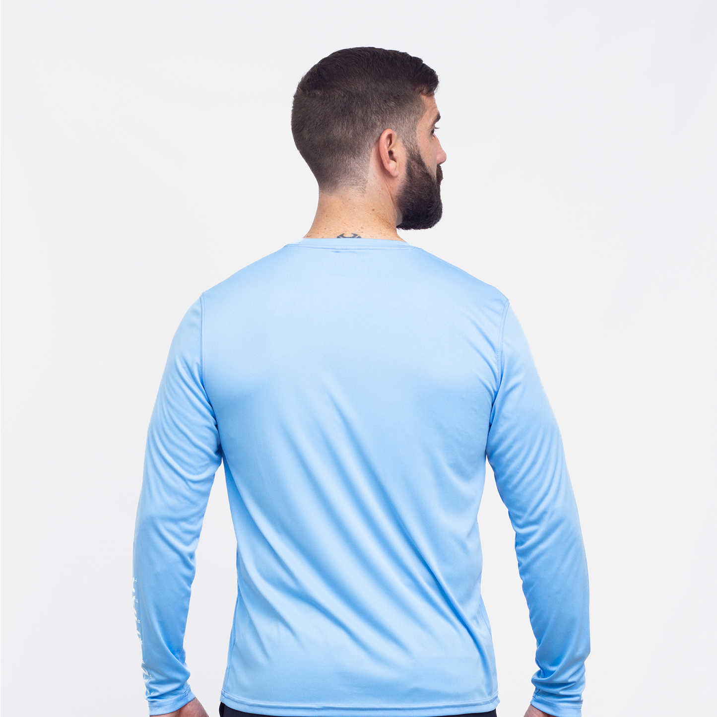 Wordmark Performance Powder Blue LS Tee